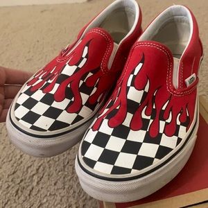 Slip on checkerboard flaming vans